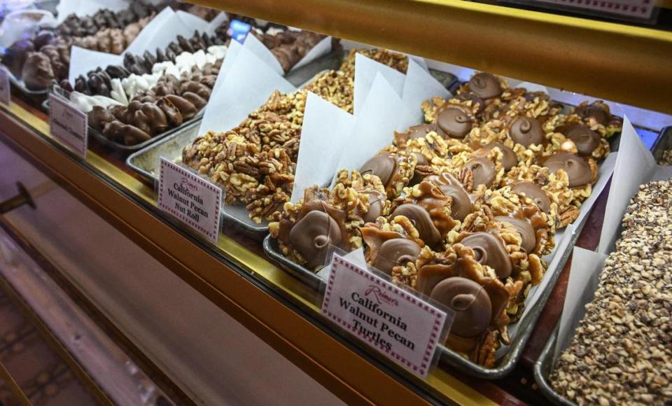 Various candies made on site, like the California walnut pecan turtles, are displayed in the candy case at Reimer’s Candies & Gifts in Three Rivers.