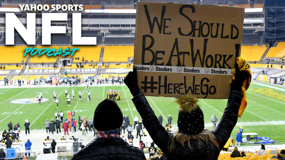 A fan holds up a sign during an extremely rare Wednesday NFL game between the Pittsburgh Steelers & Baltimore Ravens. (Photo by Joe Sargent/Getty Images)