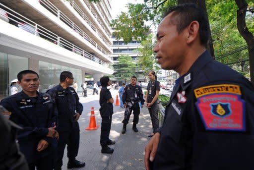 File photo shows Thai police and a commando unit standing guard near the main entrance of the building housing the Israeli embassy in Bangkok. A Malaysian court has approved the extradition of an Iranian to Thailand on suspicion of being involved in an alleged bomb plot against Israeli diplomats in the country