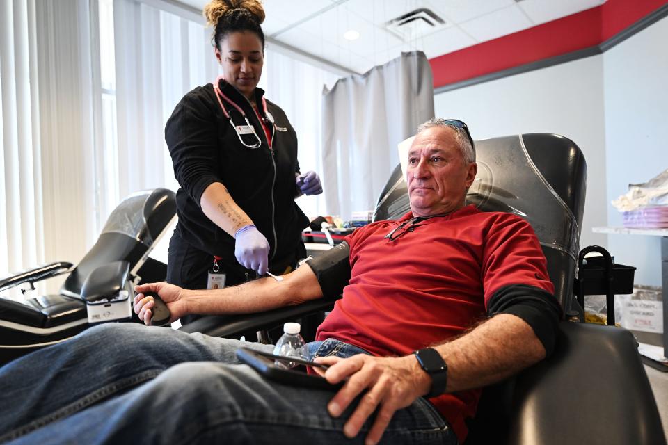 Dennis Druce is assisted in his blood donation by technician Shea Proctor at the American Red Cross Murray location on Monday, Jan. 8, 2024. | Scott G Winterton, Deseret News