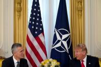 U.S. President Trump meets with NATO Secretary General Stoltenberg, ahead of the NATO summit, in London