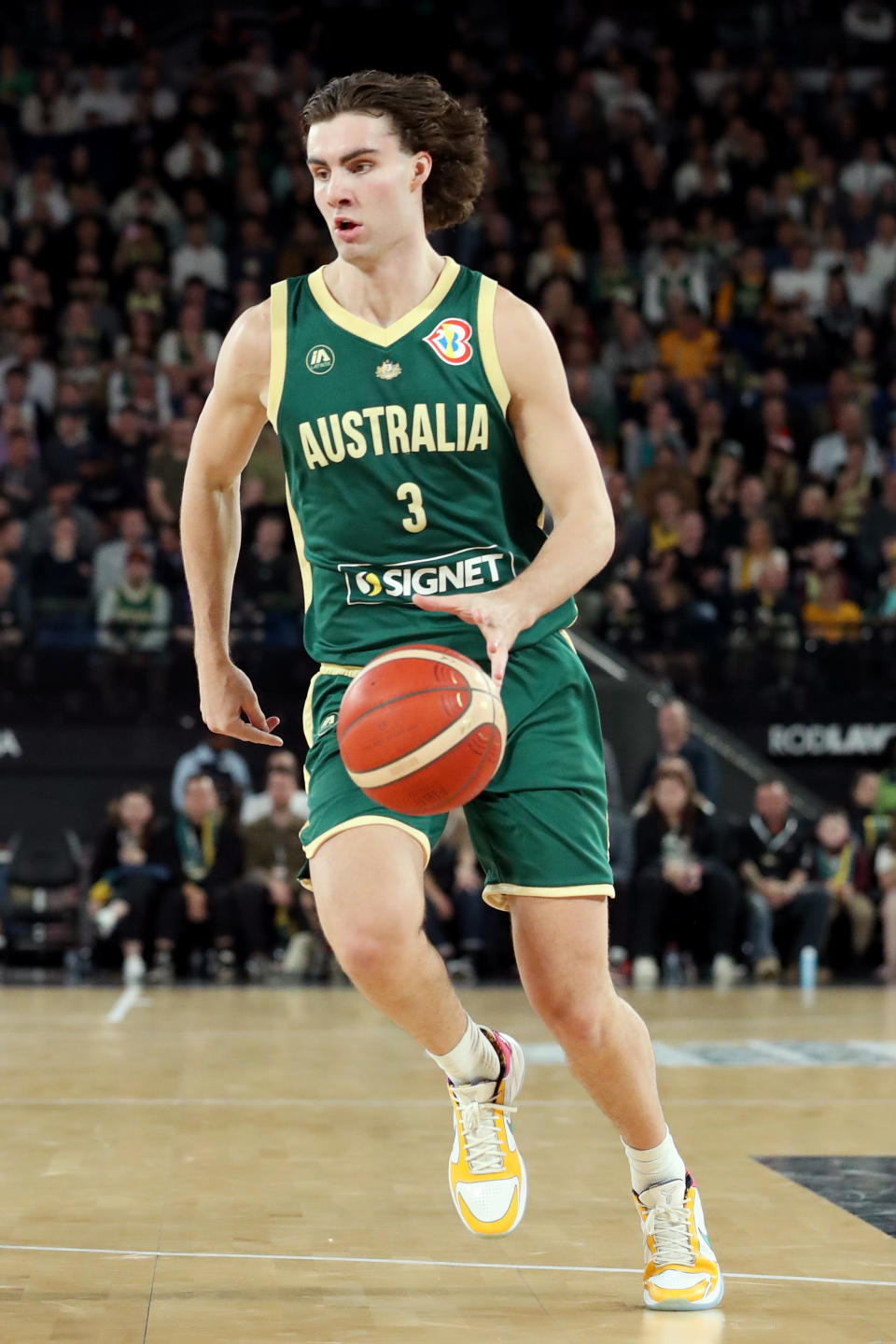 MELBOURNE, AUSTRALIA – AUGUST 16: Josh Giddey of Australia moves the ball forward during the match between the Australia Boomers and Brazil at Rod Laver Arena on August 16, 2023 in Melbourne, Australia. (Photo by Kelly Defina/Getty Images)