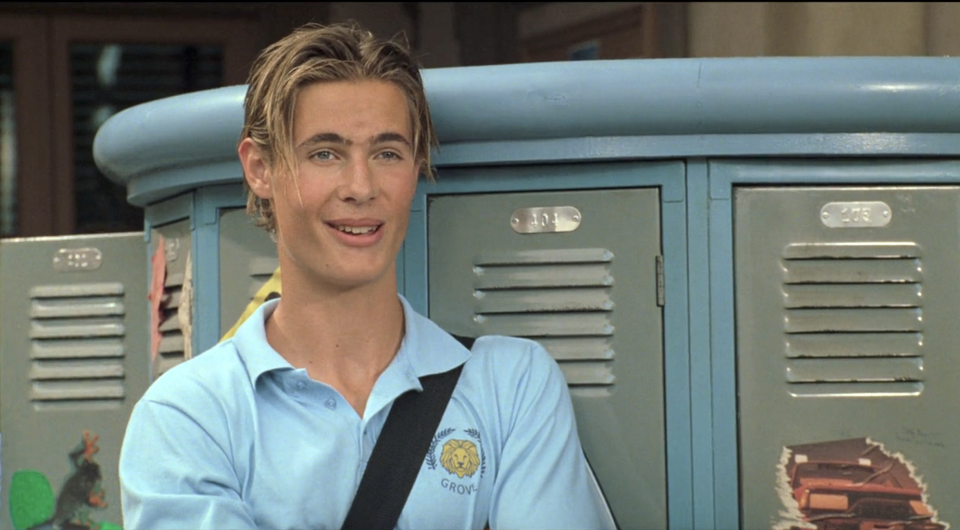 Erik von Detten smiling by some lockers