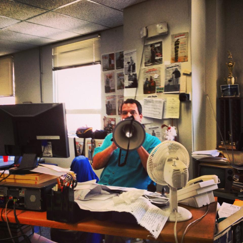 Occasionally a bullhorn has been necessary to make a point in the newsroom, columnist John Boyle claims.