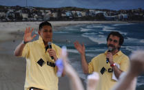 Two-time Olympic Medallist Geoff Huegill as 935 Australian sports fans spell out the word G'Day on Clapham Common in London, Wednesday, July 25, 2012. The fans attempted to break the Guinness World record for The Most People Wearing The Same Full Team Kit.