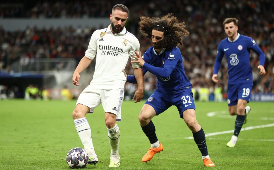 Daniel Carvajal of Real Madrid and Marc Cucurella of Chelsea during the UEFA Champions League quarterfinal first leg match between Real Madrid and Chelsea FC at Estadio Santiago Bernabeu - Getty Images/James Williamson