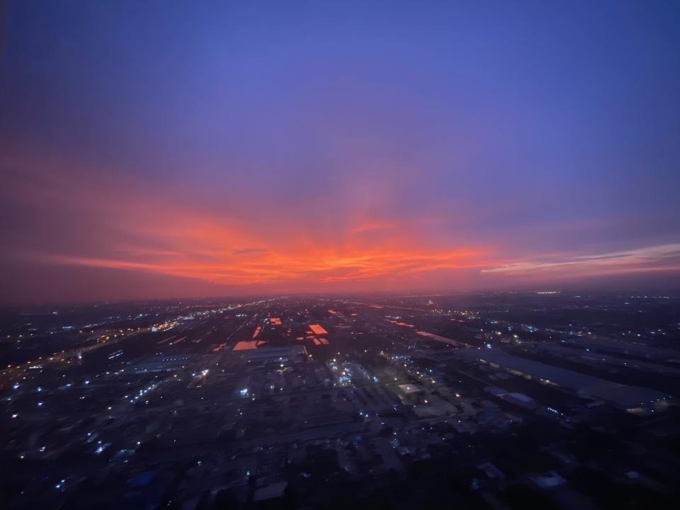 Sunrise seen from Finnair window plane seat on flight to Bangkok freelancer photo