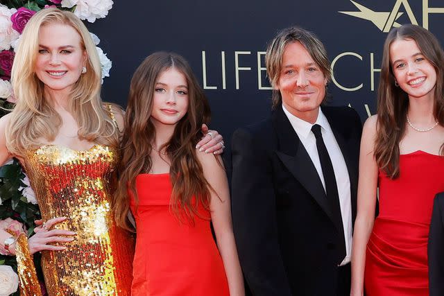 <p>Emma McIntyre/Getty</p> From left: Nicole Kidman, Faith Urban, Keith Urban and Sunday Urban