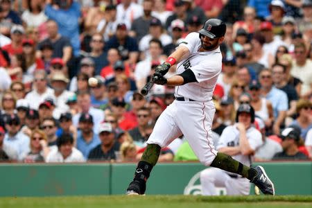 May 26, 2018; Boston, MA, USA; Boston Red Sox first baseman Mitch Moreland (18) hits a RBI double against the Atlanta Braves during the sixth inning at Fenway Park. Mandatory Credit: Brian Fluharty-USA TODAY Sports