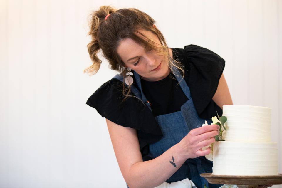 Whitney Leighton makes high-end cakes for her business, Little Blackbird Bakery. Since catching COVID in December, her sense of smell and taste have been distorted. That's a major problem for a baker, but she has adapted by stringently following recipes, leaning on her baking assistants and using family as taste testers.