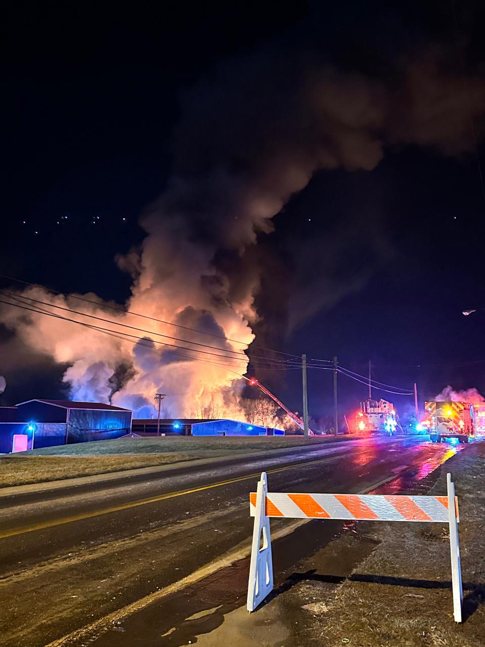 In this photo from Jordan Miller News, smoke billows early Saturday morning from train cars on fire after a train derailment in East Palestine, Ohio.