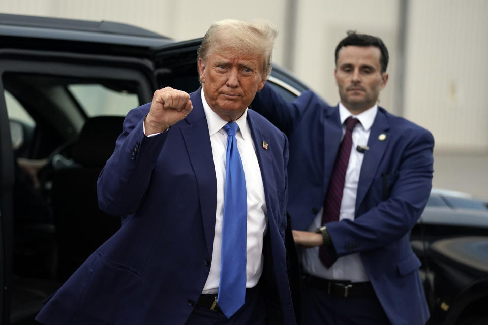 Republican presidential candidate former President Donald Trump arrives to board his plane at Manchester-Boston Regional Airport, Monday Oct. 23, 2023, in Londonderry, N.H. (AP Photo/Charles Krupa)