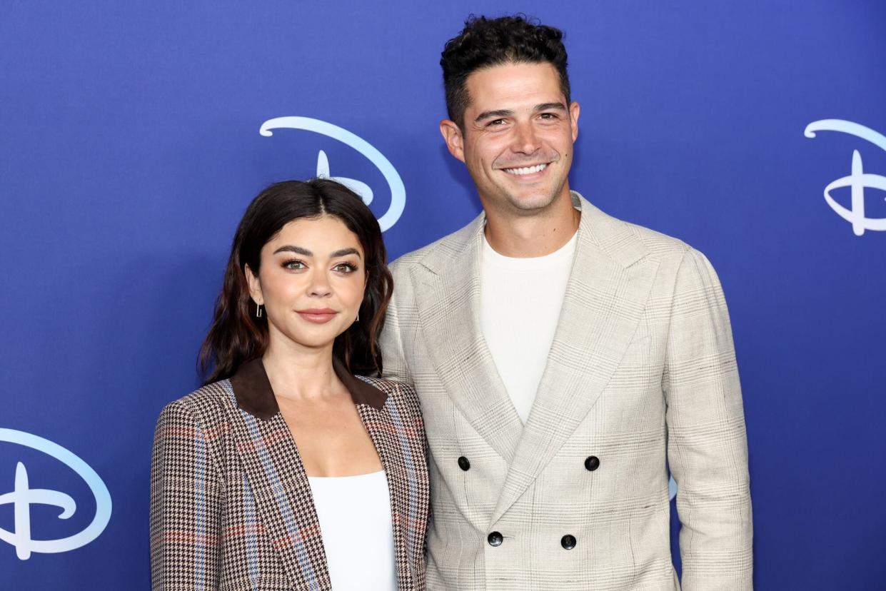 NEW YORK, NEW YORK - MAY 17: Sarah Hyland and Wells Adams attend the 2022 ABC Disney Upfront at Basketball City - Pier 36 - South Street on May 17, 2022 in New York City. (Photo by Dia Dipasupil/Getty Images)