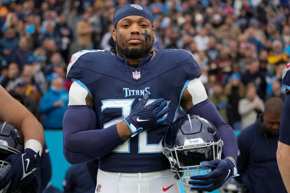 Tennessee Titans running back Derrick Henry stands for the national anthem before an NFL football game against the Jacksonville Jaguars, Sunday, Jan. 7, 2024, in Nashville, Tenn.