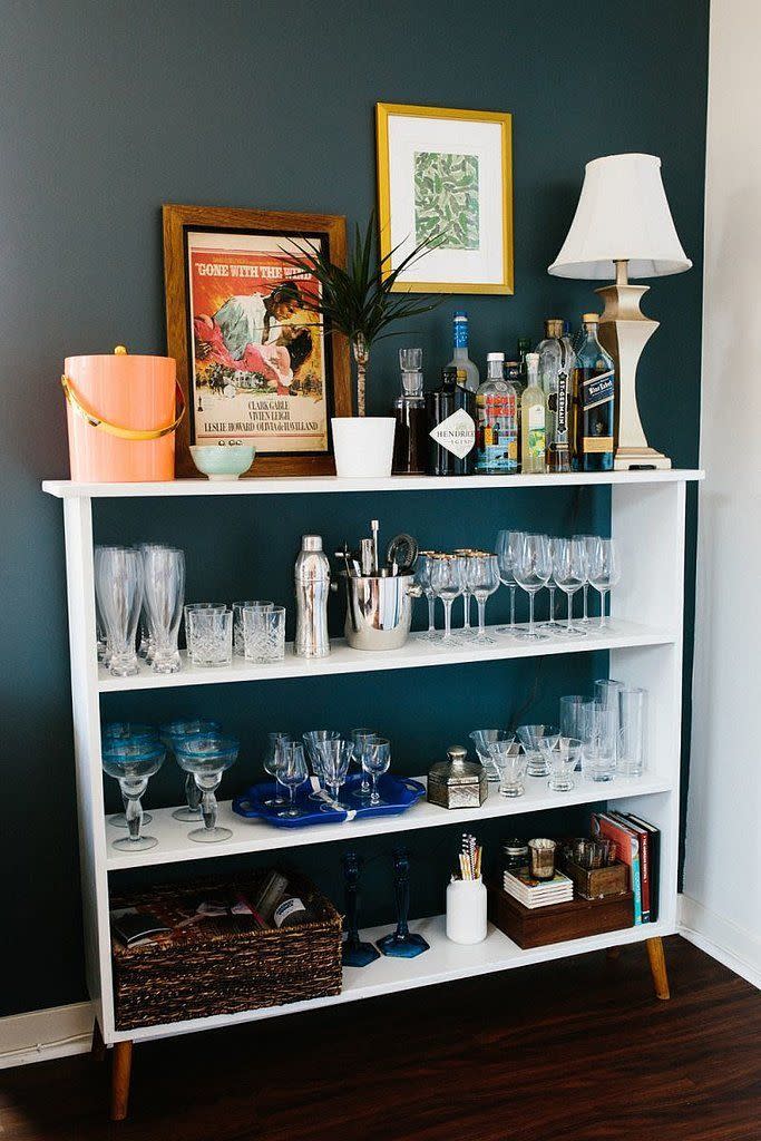 The Bookcase Bar  Got an old, unused bookcase lying around? Give it a second lease of life by transforming it into a home for your glass – and alcohol – collection.