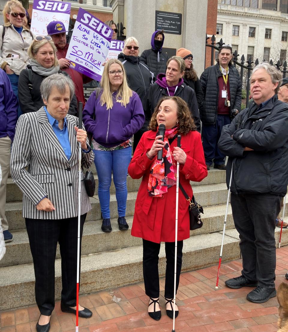 Former National Federation of the Blind in Massachusetts President Amy Ruel, left, discusses actions taken to oust the director of the state Commission for the Blind with Nona Haroyan of Worcester from the Bay State Council of the Blind.