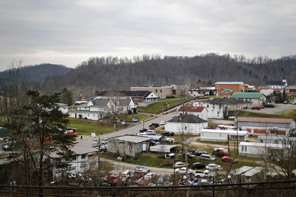 Main Street, center, cuts through Sandy Hook, Ky., Thursday, Dec. 14, 2017. Despite the president's plummeting approval ratings, he remains profoundly popular in these mountains, a region so badly battered by the collapse of the coal industry it became the symbolic heart of Trump's white working-class base. (AP Photo/David Goldman)