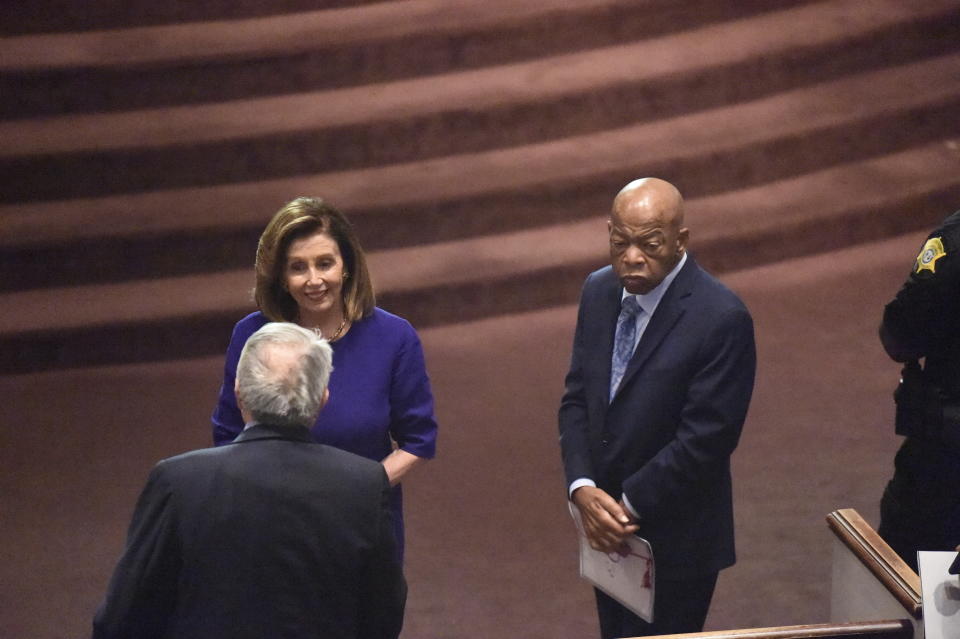 House Speaker Nancy Pelosi, U.S. Reps. GK Butterfield, left, and John Lewis, right, speak on Sunday, Sept. 22, 2019, at funeral services for Emily Clyburn, wife of House Majority Whip Jim Clyburn of South Carolina, in West Columbia, S.C. (AP Photo/Meg Kinnard)
