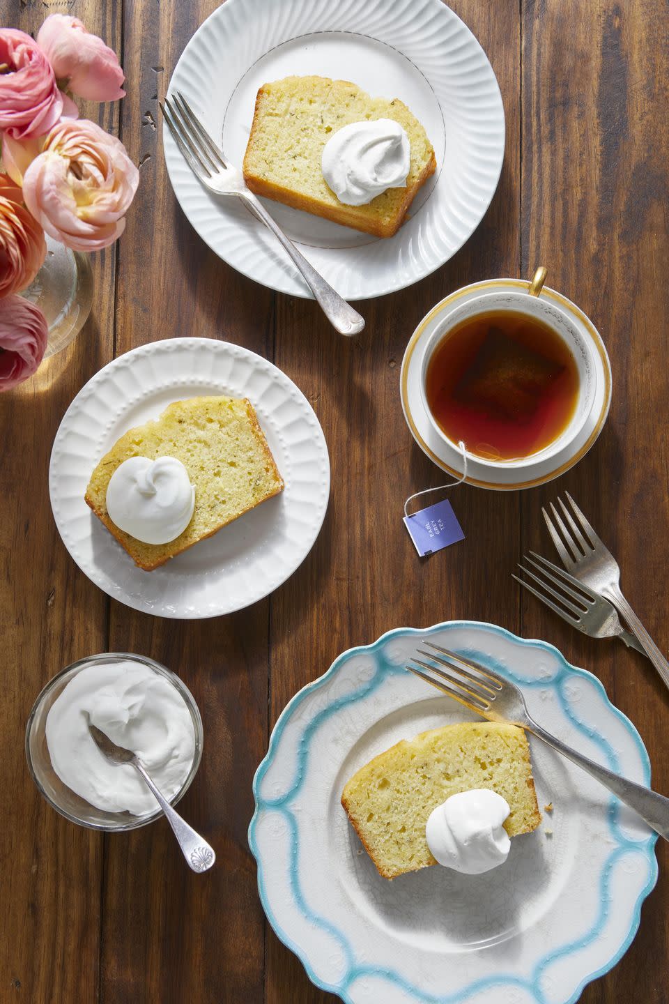 <p>If this year's Mother's Day celebration is tending more toward a small gathering, then you can create something elegant without going big. This simple sweet cake is delicious with a dollop of whipped cream, and pairs well with a strong cup of tea.</p><p><strong><a href="https://www.countryliving.com/food-drinks/a34962573/lemon-rosemary-tea-bread-recipe/" rel="nofollow noopener" target="_blank" data-ylk="slk:Get the recipe for Lemon-Rosemary Tea Bread;elm:context_link;itc:0;sec:content-canvas" class="link ">Get the recipe for Lemon-Rosemary Tea Bread</a>.</strong> </p>