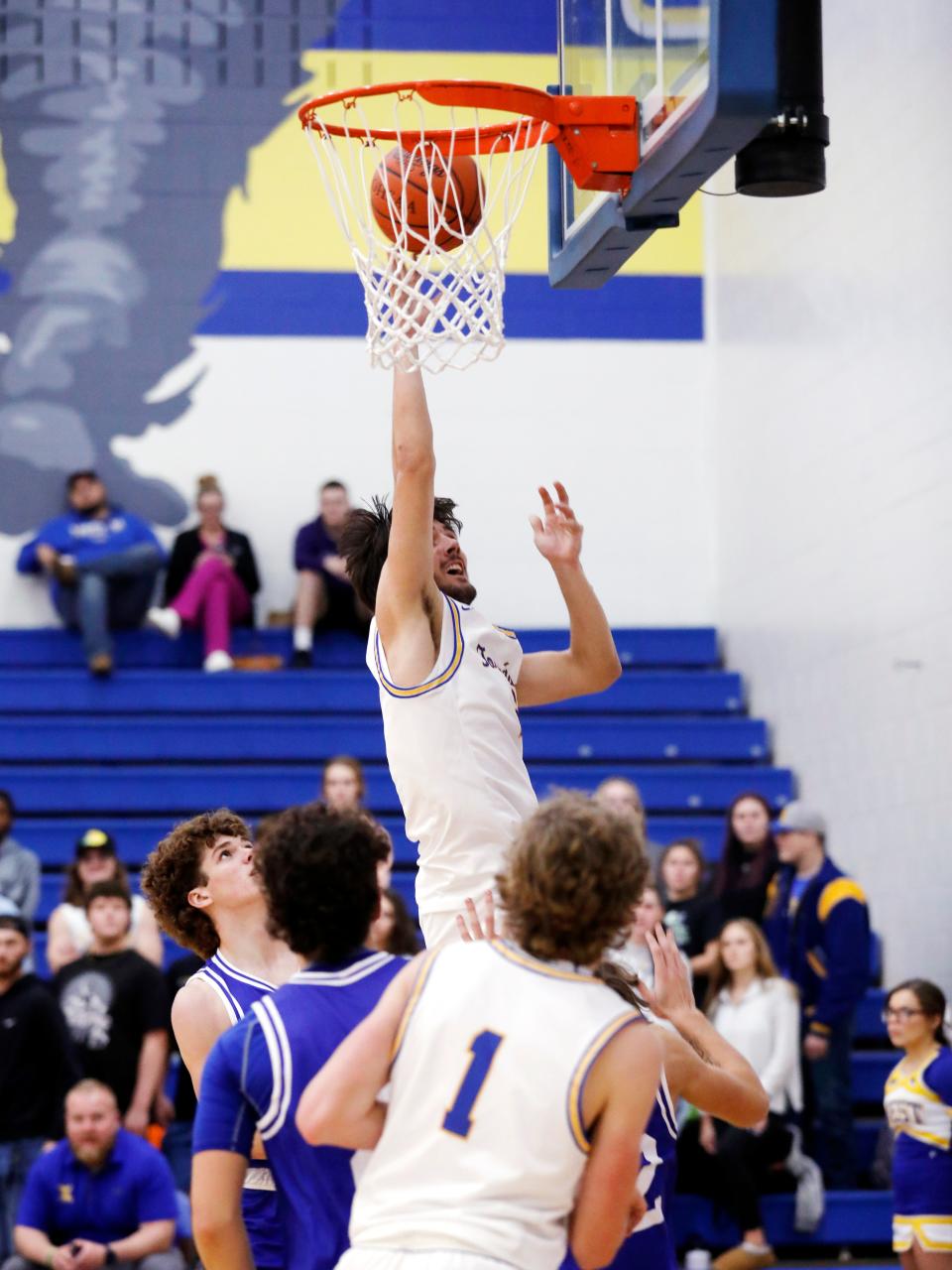 Noah Ray scores inside during West Muskingum's 57-37 win against visiting Cambridge in a nonleague game on Tuesday night in Falls Township.