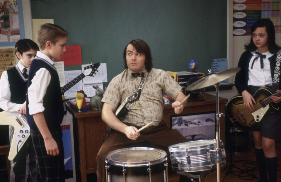 Dewey Finn (Jack Black) teaches his students how to rock ‘n’ roll in “School of Rock.” 1996-98 AccuSoft Inc., All rights reserved