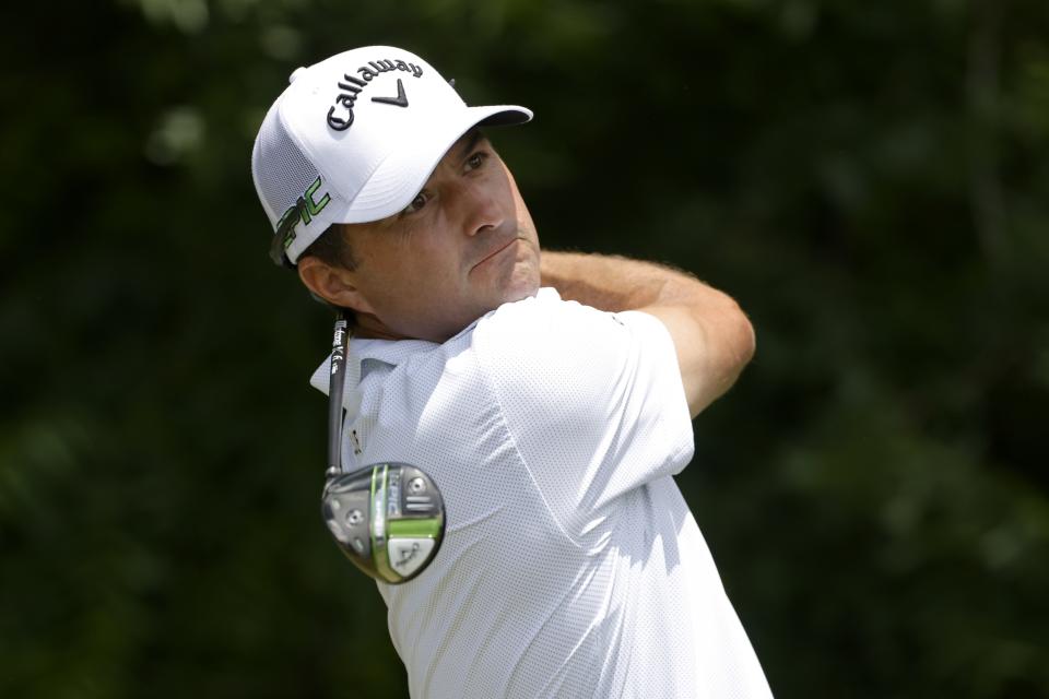 Kevin Kisner follows his hit off the sixth tee during the third round of the Charles Schwab Challenge golf tournament at Colonial Country Club in Fort Worth, Texas, Saturday, May 29, 2021. (AP Photo/Ron Jenkins)