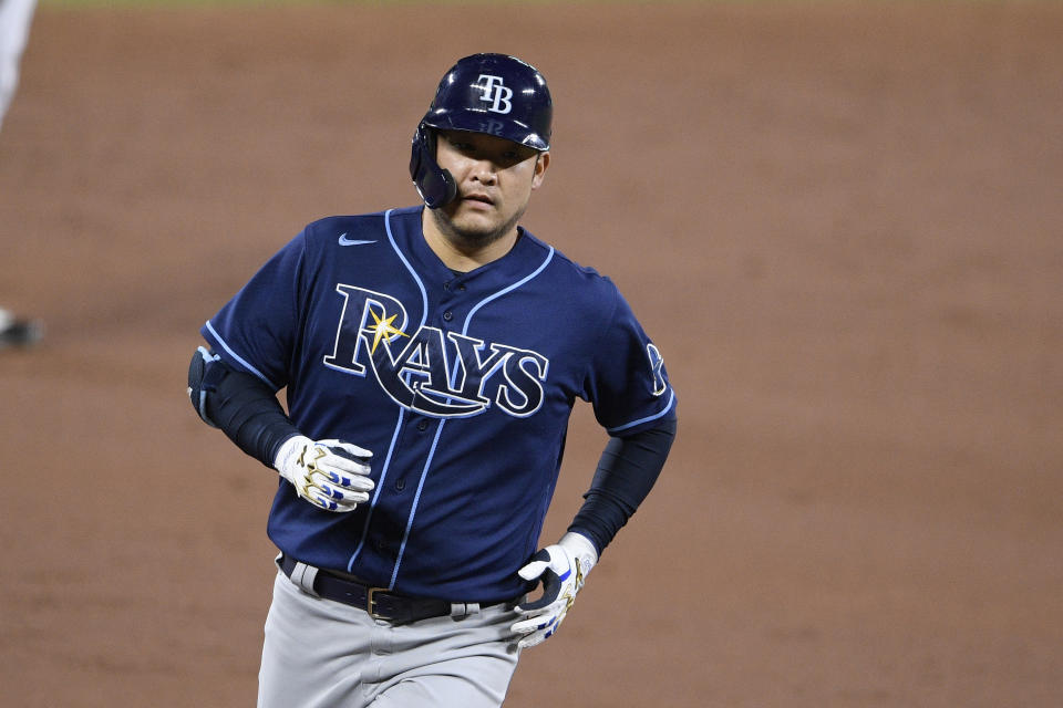 Tampa Bay Rays' Yoshitomo Tsutsugo, of Japan, rounds the bases on his home run during the third inning of a baseball game against the Baltimore Orioles, Saturday, Sept. 19, 2020, in Baltimore. (AP Photo/Nick Wass)