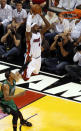 Miami Heat's LeBron James (6) dunks the ball over Boston Celtic's Paul Pierce during the first half of Game 1 in their NBA basketball Eastern Conference finals playoffs series, Monday May, 28, 2012, in Miami. (AP Photo/Wilfredo Lee)