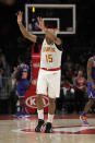 Atlanta Hawks guard Vince Carter acknowledges the fans after hitting a three-point shot in the final seconds of overtime in an NBA basketball game against the New York Knicks Wednesday, March 11, 2020, in Atlanta. (AP Photo/John Bazemore)