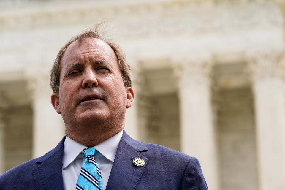 Texas Attorney General Ken Paxton outside the Supreme Court on April 26, 2022. (Elizabeth Frantz / Reuters file)