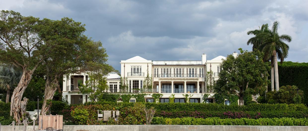 The three levels of the house at 726 Hi Mount Road can be seen when the residence is viewed from its dock in the Intracoastal Waterway. From the street, however, the house appears to have just two stories. With 150 feet of lakefront, the lot has a downward slope of about 16 feet.