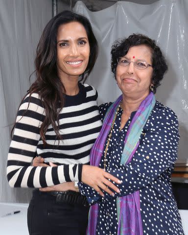 <p>David Livingston/Getty</p> Padma Lakshmi and her mom Vijaya