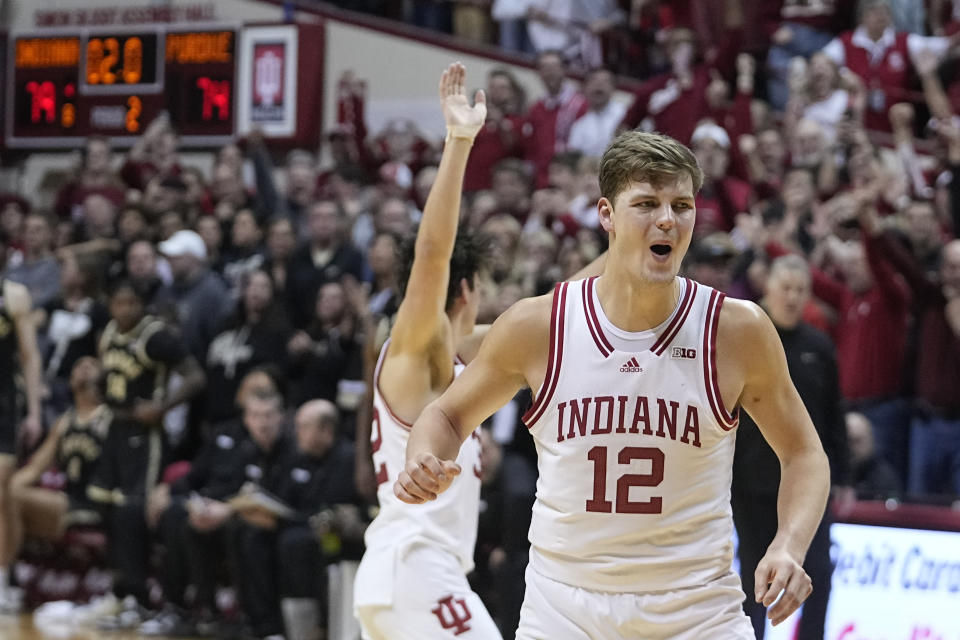 Indiana's Miller Kopp (12) reacts after Indiana defeated Purdue in an NCAA college basketball game, Saturday, Feb. 4, 2023, in Bloomington, Ind. (AP Photo/Darron Cummings)