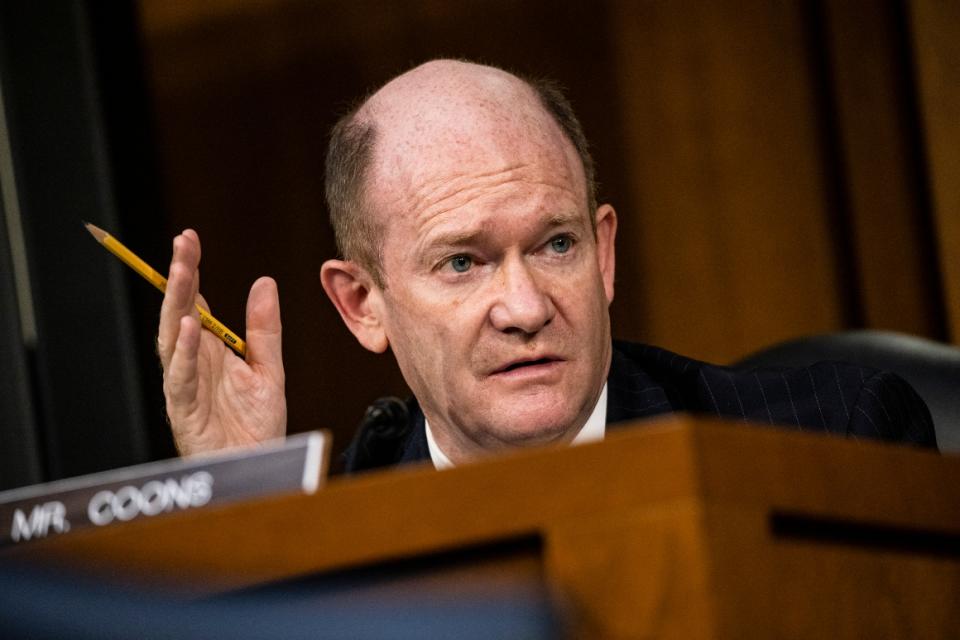 Sen. Chris Coons (D-Del.) speaks during a hearing.