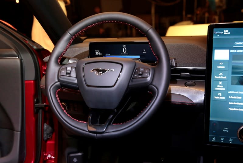 A digital dashboard is seen in the interior of Ford Motor Co's all-new electric Mustang Mach-E vehicle at a studio in Warren, Michigan