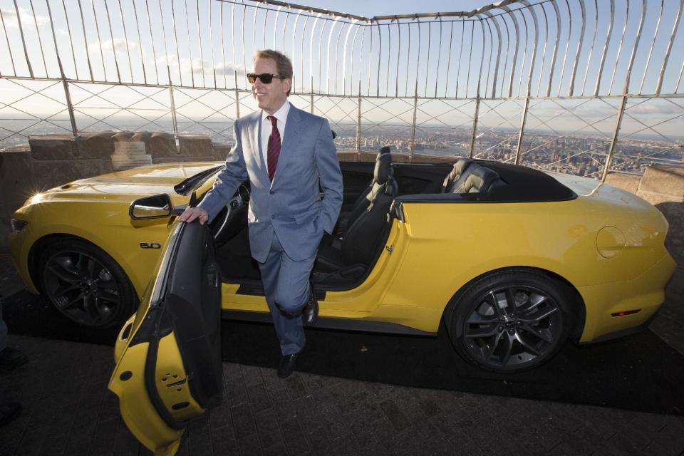 Bill Ford, Ford Motor Company's executive chairman, stands with the all-new 2015 Mustang convertible as it's introduced on the 86th floor observation deck of the Empire State Building during the New York International Auto Show, Wednesday, April 16, 2014, in New York. (AP Photo/John Minchillo)