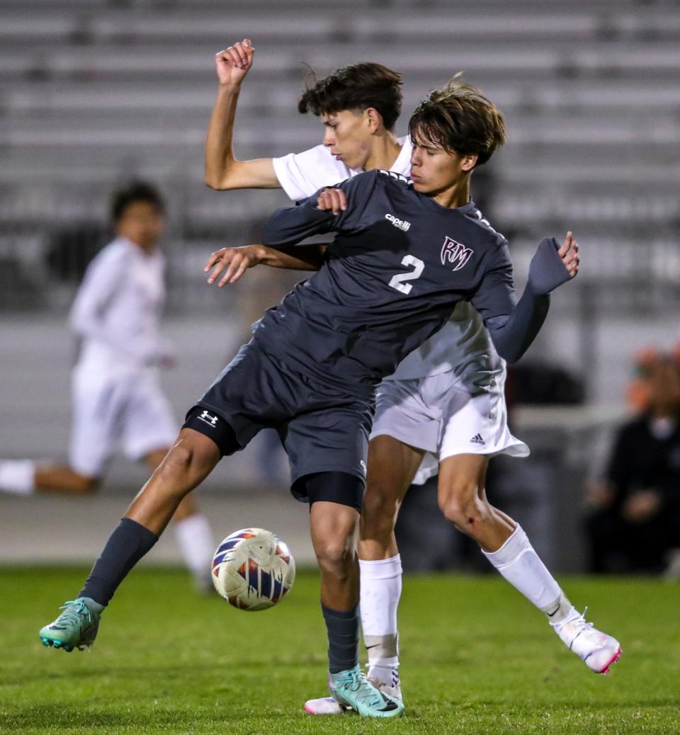 Rancho Mirage's Marco Sanchez (2) competes with University Prep's Yahir Martinez for control of the ball during the second half of their CIF-SS Division 5 second-round playoff game in Rancho Mirage, Calif., Friday, Feb. 9, 2024.