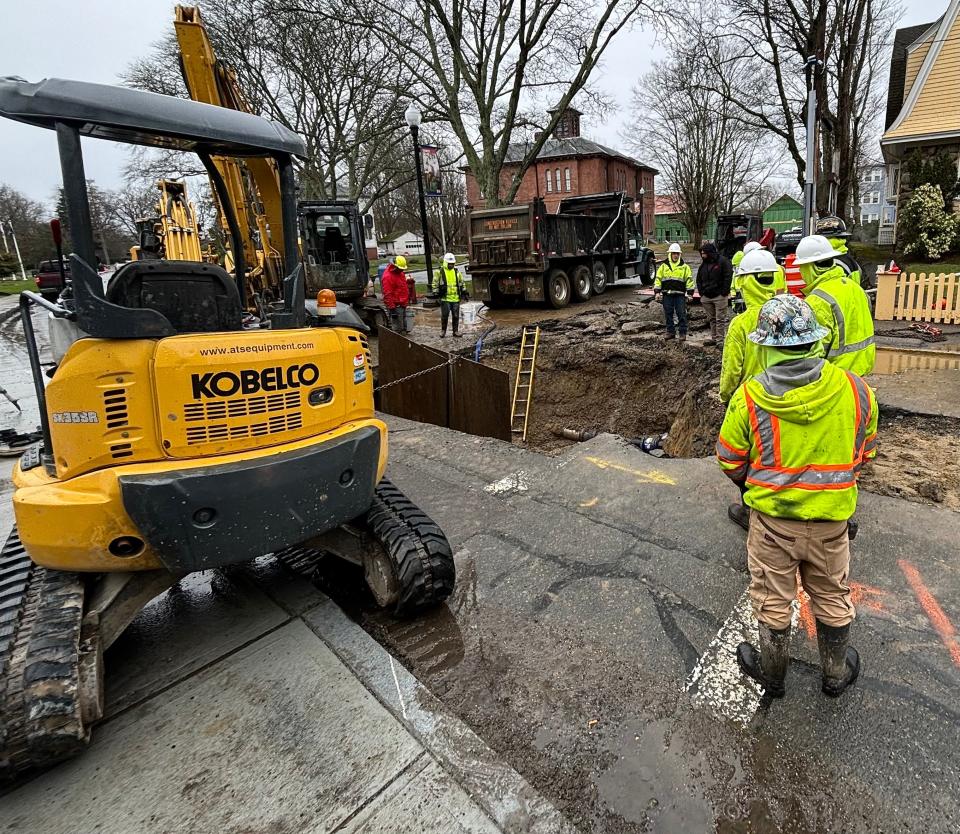 A work crew in Taunton was busy on April 4 working on water and sewer lines in front of Old Colony History Museum.