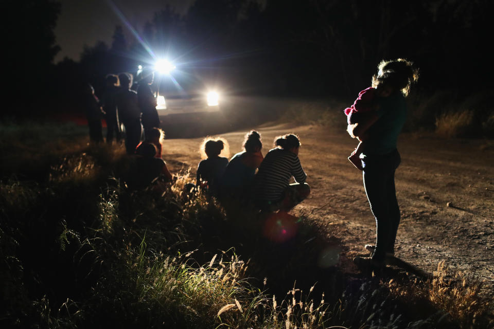 <p>U.S. Border Patrol agents arrive to detain a group of Central American asylum seekers near the U.S.-Mexico border on June 12, 2018 in McAllen, Texas. (Photo: John Moore/Getty Images) </p>