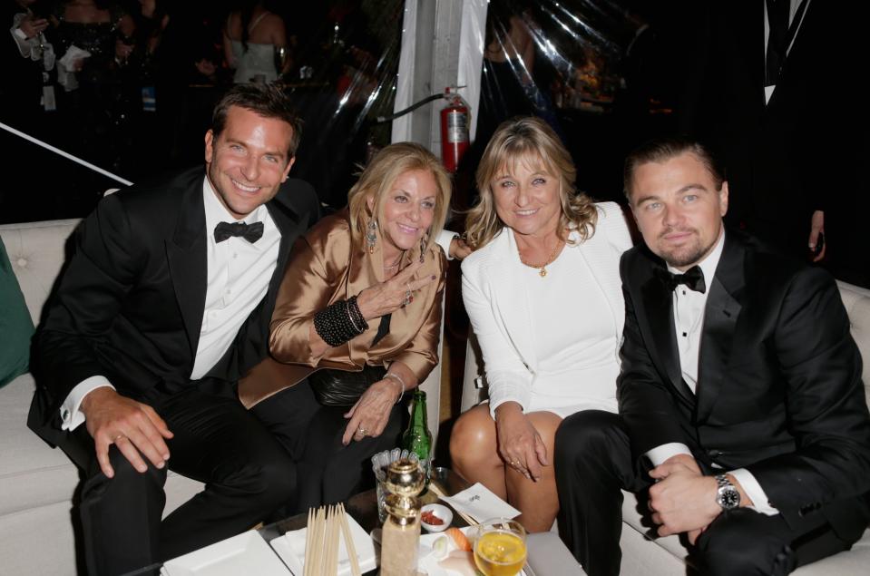 Bradley Cooper, Cooper's mother Gloria Campano, Irmelin Indenbirken and Leonardo DiCaprio after the 2014 Golden Globes.