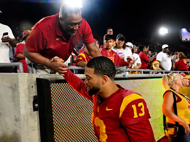 <p>Keith Birmingham/MediaNews Group/Pasadena Star-News/Getty</p> Caleb Williams shakes hands with his father Carl Williams after defeating the San Jose State Spartans 56-28 during a NCAA football game on August 26, 2023.