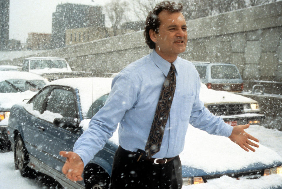 Bill Murray runs through the snow in a scene from Groundhog Day