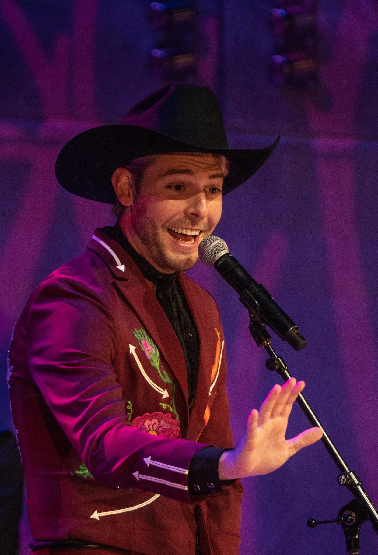 Sam Williams acknowledges someone in the audience before performing his version of "I'm So Lonely I could Cry," a song written by his grandfather, Hank Williams, during Hank WIlliams' 100th birthday celebration at Country Music Hall of Fame Thursday afternoon, Sept. 21, 2023.