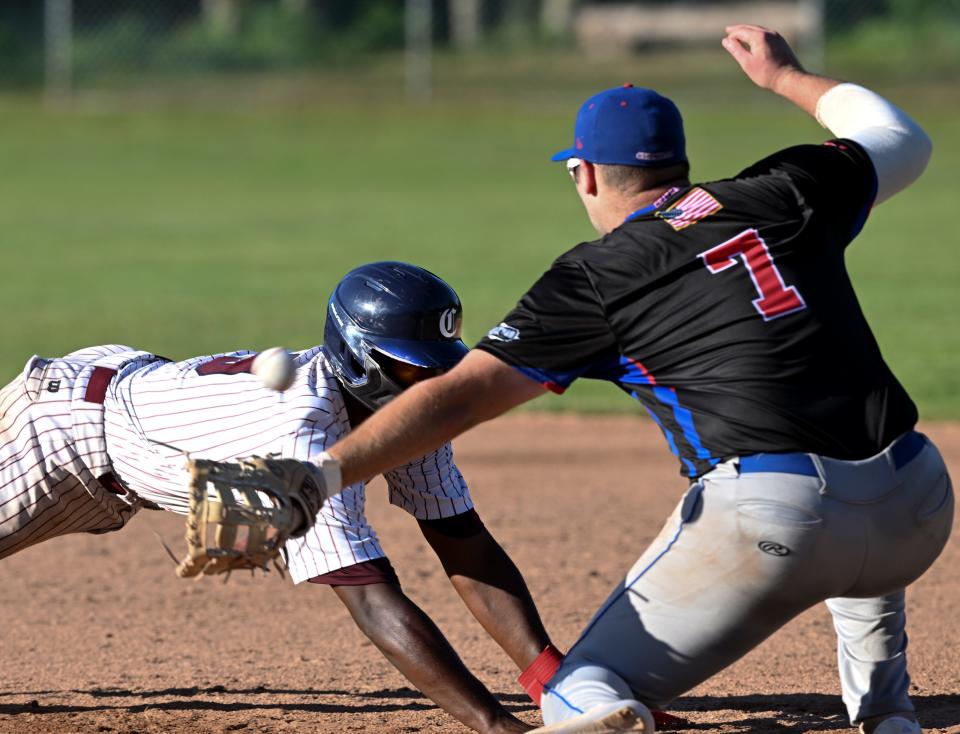 COTUIT   6/23/22   Cam Collier of Cotuit dives back to first as the throw gets past Chatham first baseman Noah Ledford.