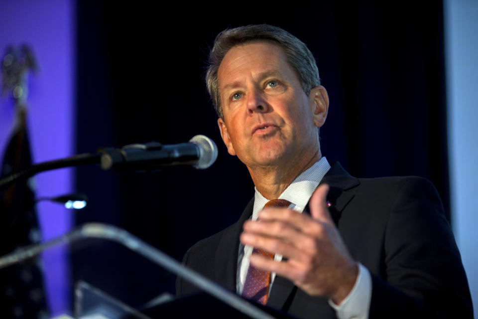 In this image provided by the Georgia Port Authority, Georgia Gov. Brian Kemp speaks during the Georgia Ports Authority's Savannah State of the Port event, Thursday, Sept. 12, 2019, in Savannah, Ga. The GPA plans to double capacity at Garden City Terminal to 11 million twenty-foot equivalent container units per year. In Fiscal Year 2019, port-related industries announced $5 billion in new investment and 12,000 new jobs coming to Georgia. (Stephen Morton/Georgia Port Authority via AP)