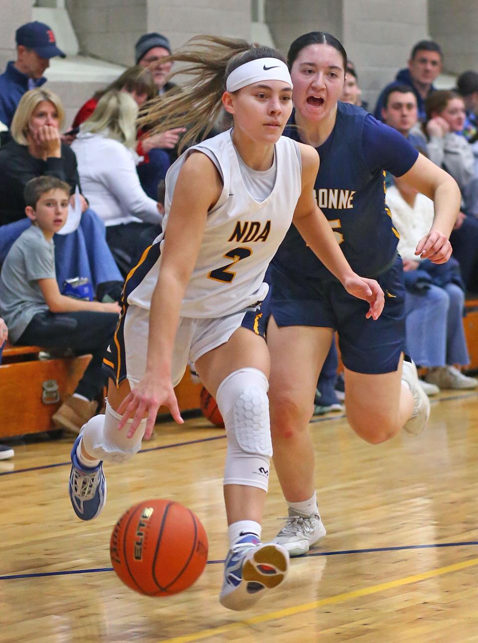 Ava Orlando of NDA drives toward the basket.
Notre Dame Hingham hosts Fontbonne Academy Milton in girls basketball on Friday Jan. 12, 2024