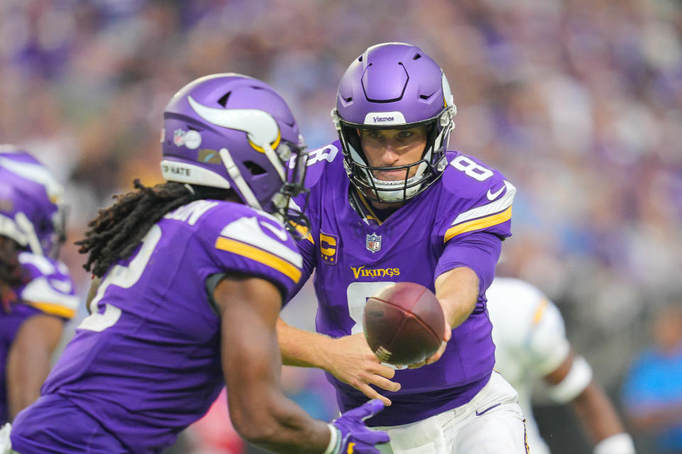 Sep 24, 2023; Minneapolis, Minnesota, USA; Minnesota Vikings quarterback Kirk Cousins (8) hands the ball off to running back Alexander Mattison (2) against the Los Angeles Chargers in the third quarter at U.S. Bank Stadium. Mandatory Credit: Brad Rempel-USA TODAY Sports