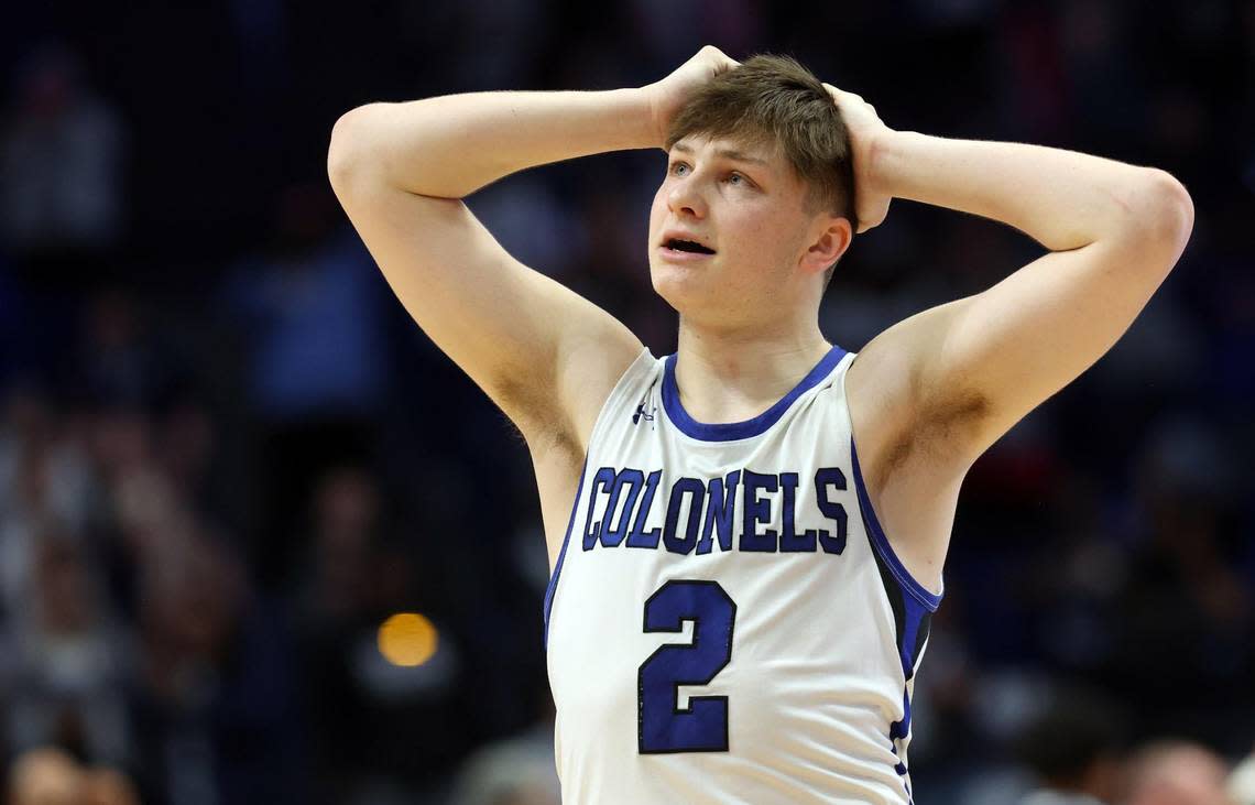 Covington Catholic’s Evan Ipsaro looks to the stands after his team was defeated by Warren Central in the semifinals of the Sweet 16 tournament at Rupp Arena on March 19.