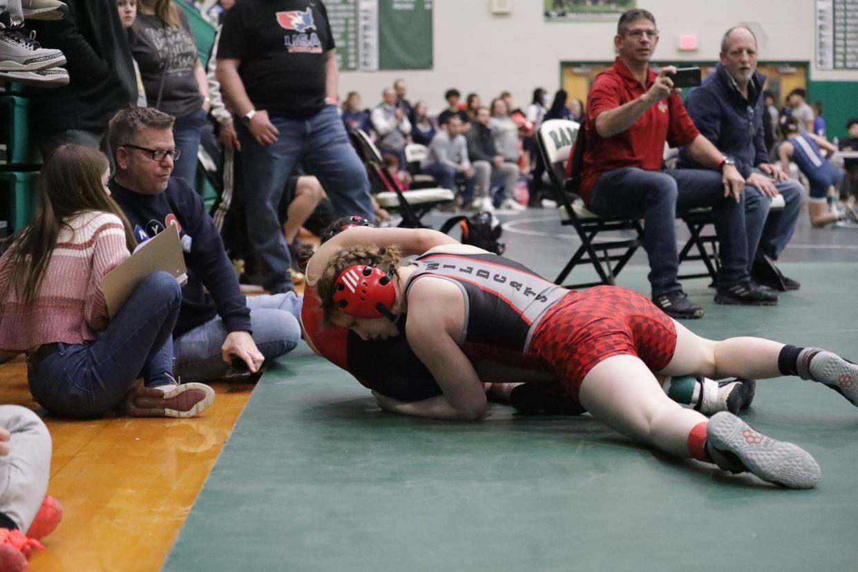 Northwestern's Sierra Chiesa takes down Journie Rodriquez of McCaskey near the edge of the mat in the 112-pound title match in the 2022 MyHouse Pennsylvania Girls High School State Championships on Sunday. Chiesa won by pin.