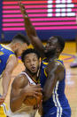 Cleveland Cavaliers forward Lamar Stevens, left, is defended by Golden State Warriors forward Draymond Green during the second half of an NBA basketball game in San Francisco, Monday, Feb. 15, 2021. (AP Photo/Jeff Chiu)